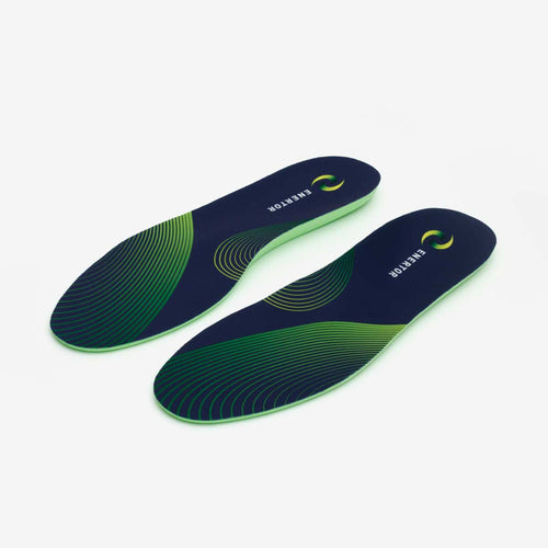 Pair of blue and green shoe insoles on a white background